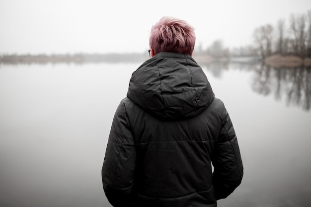 Close-up of sad lonely girl in nature