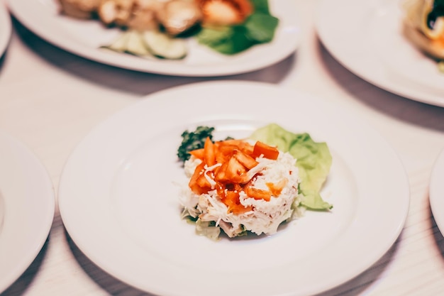 Close up salad with chicken and fresh tomatoes