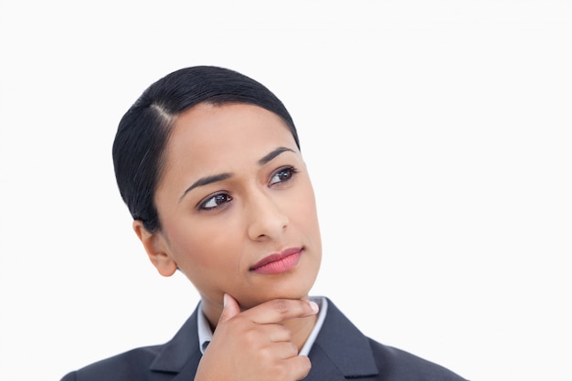 Close up of saleswoman in thoughts