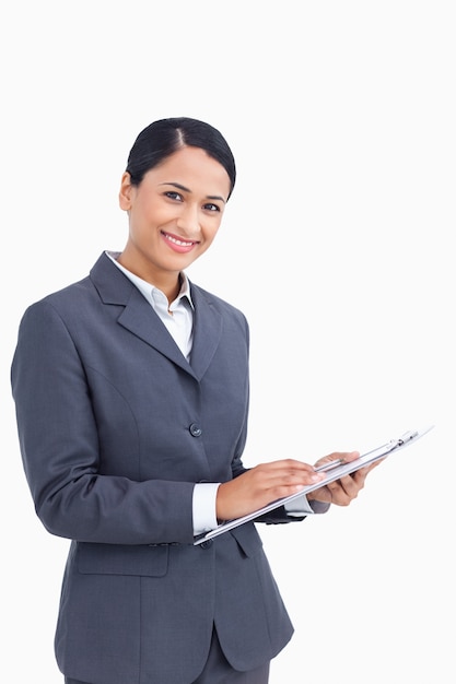 Close up of saleswoman with pen and clipboard