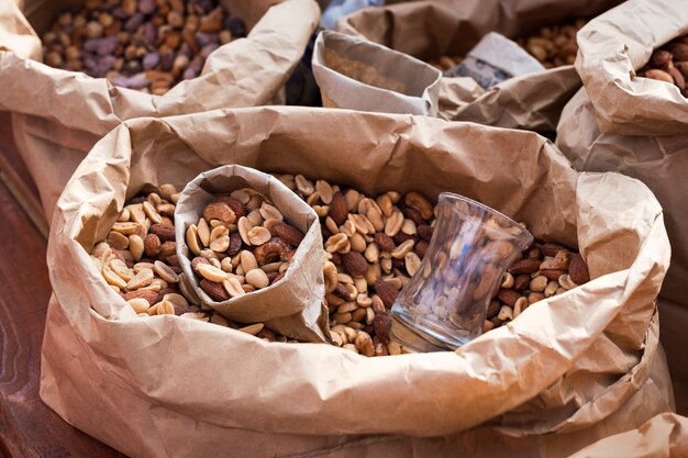 close up of Salted peanuts in a paper bag