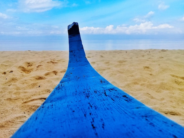 Foto close-up della sabbia sulla spiaggia contro il cielo