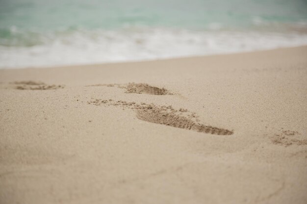 Foto prossimo piano della sabbia sulla spiaggia