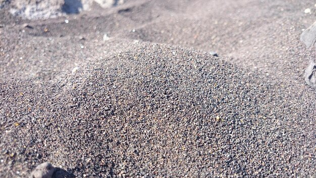 Foto prossimo piano della sabbia durante una giornata di sole