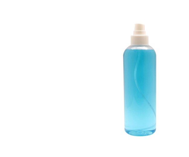 Close-up of sanitizer bottle against white background