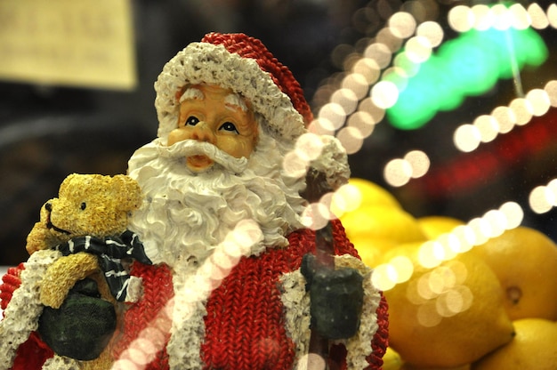 Close-up of santa claus statue at night