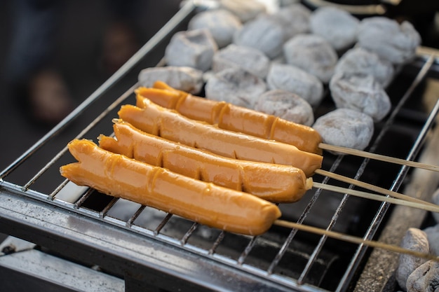 Close up of satay sausages being sold at street food