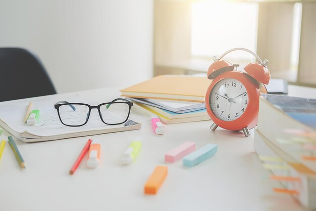 Photo close-up of school supplies at desk