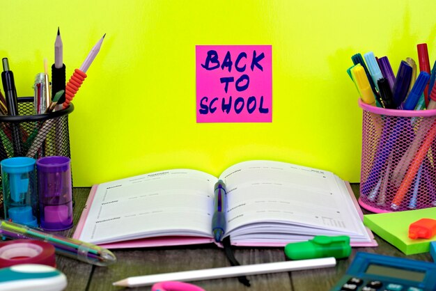 Close-up of school supplies with back to school background