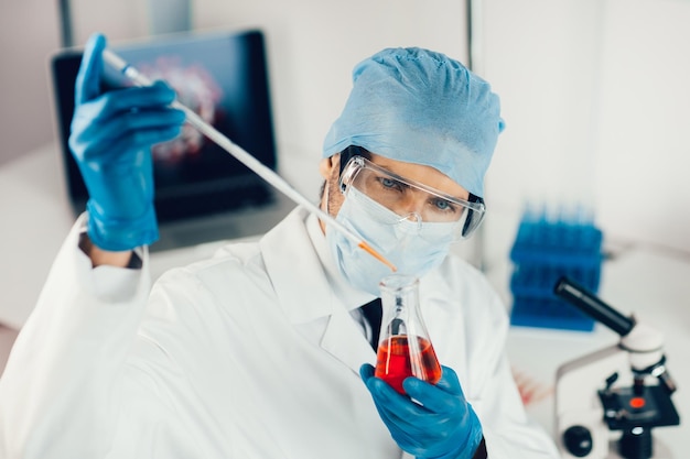 Close up scientist conducts research in the laboratory