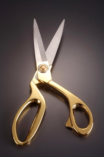 close-up of scissor against gray background