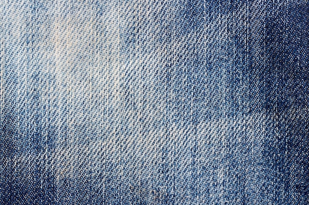 close up of scratch effect on denim jeans