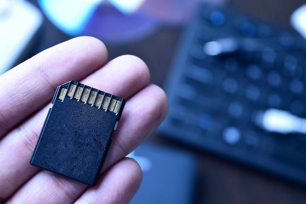 Photo close up of sd card in hand