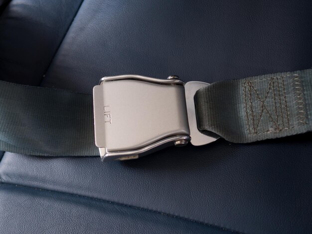 Close-up of seat belt in car