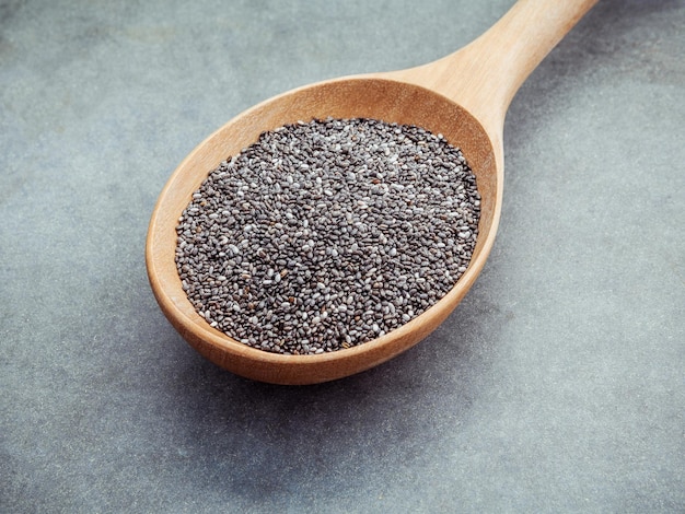 close-up of seeds in wooden spoon
