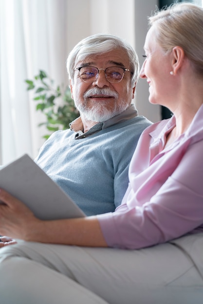 Photo close up on senior couple while learning