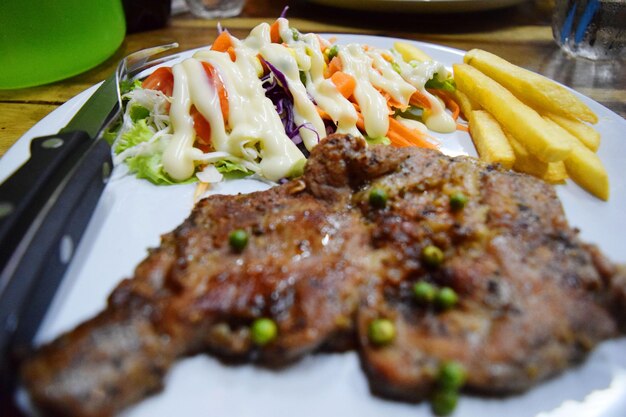 Close-up of served food in plate