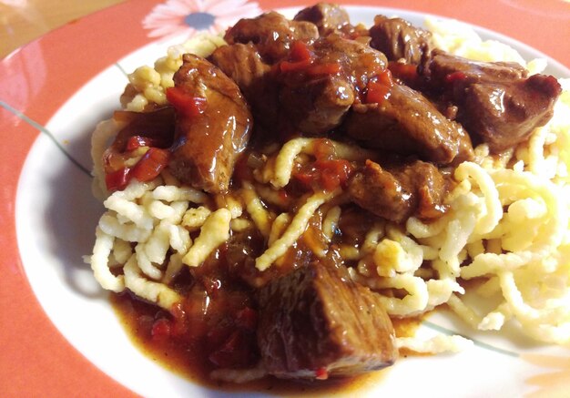 Close-up of served food in plate