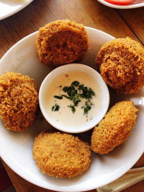 Close-up of served food on table