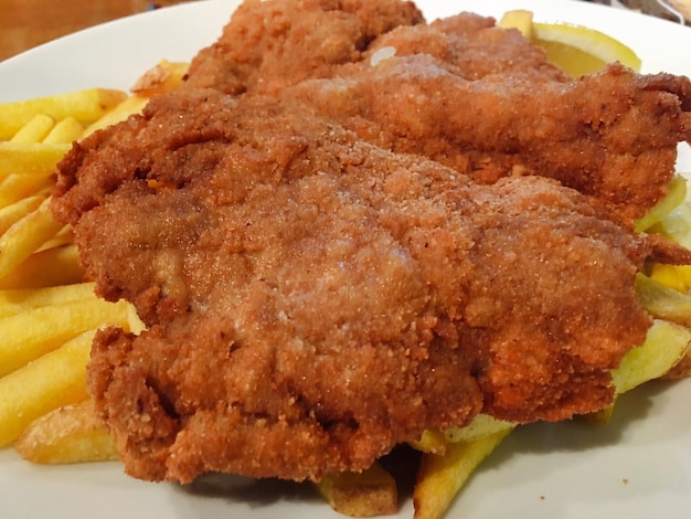 Close-up of served meat in plate