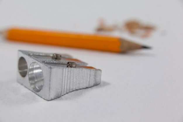 Photo close-up of sharpener and pencil