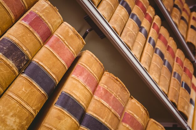 Close up of shelf with old books