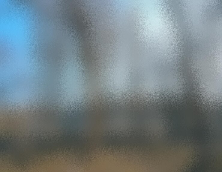 Photo a close up of a shiny surface with a blue sky in the background