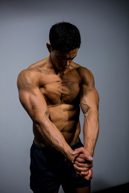 Close-up of shirtless muscular man