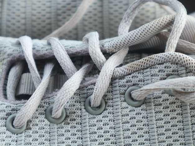 Photo a close up of a shoe with a string tied around it