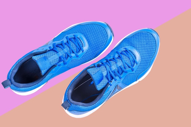 Close-up of shoes against blue background