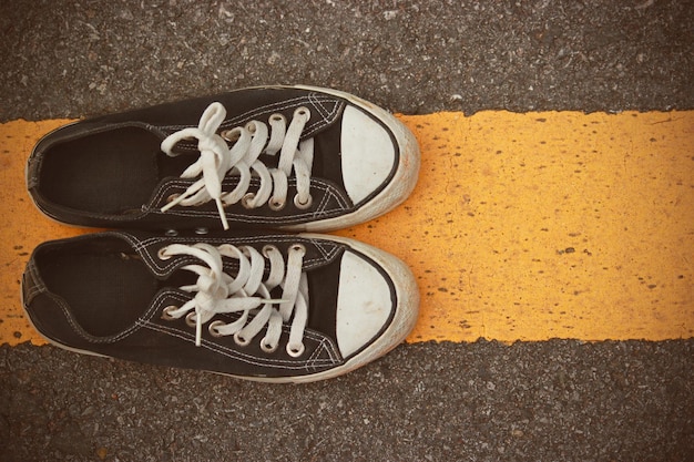 Photo close-up of shoes on road