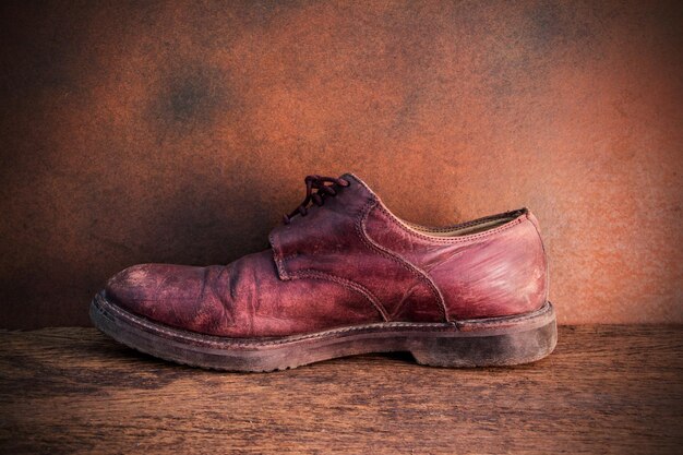 Photo close-up of shoes on table