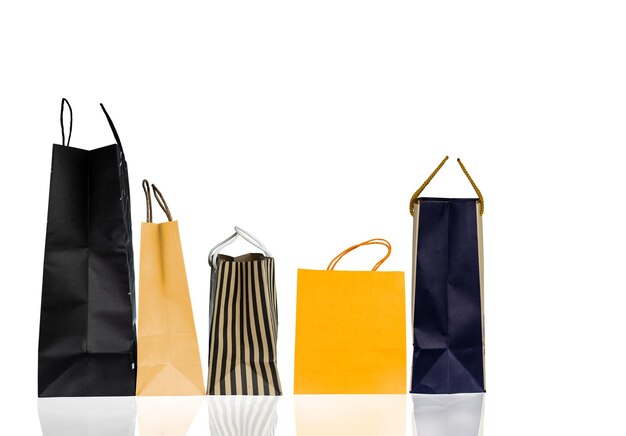 Photo close-up of shopping bags against white background