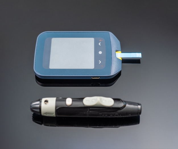 Photo close up shot of  blood sugar level tester