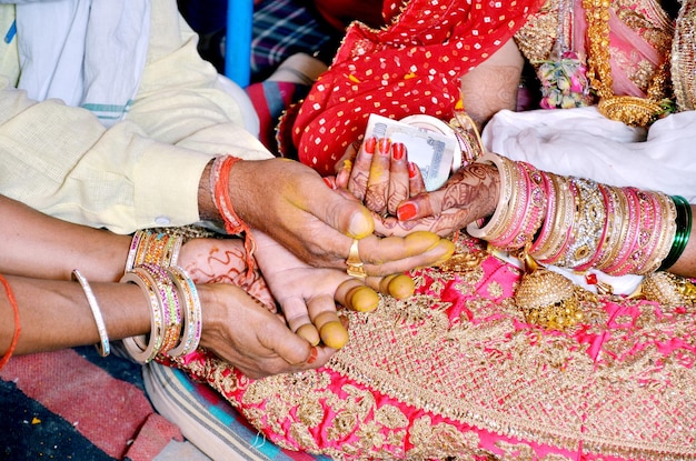 Close up shot of Bride performing religious rituals