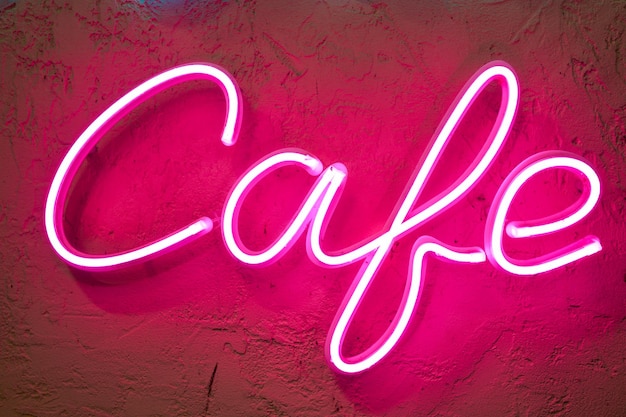 Foto immagine ravvicinata dell'insegna al neon cafe