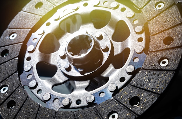 Close-up shot of clutch disk and basket on dark background