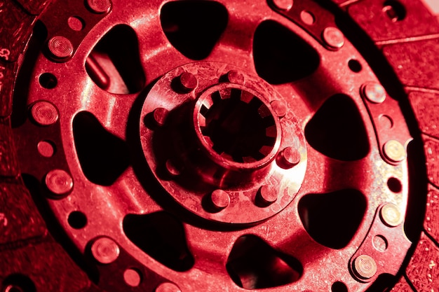 Close-up shot of clutch disk and basket on dark background