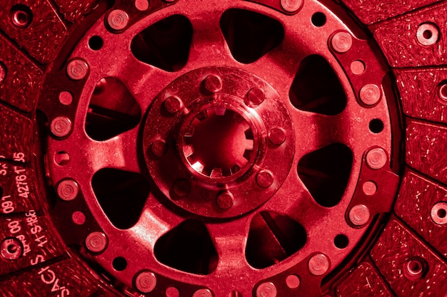 Close-up shot of clutch disk and basket on dark background