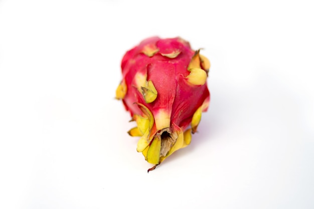 Close up shot fresh whole dragon fruit isolated on white background. Exotic Thai Fruit. Pitaya. Healthy food.