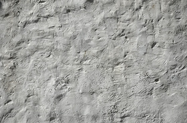 Close up shot of grunge brown clay wall on a old house