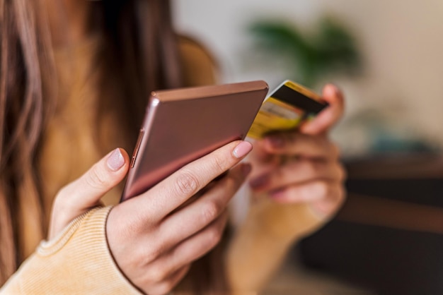 Close up shot of a mobile phone purchasing with credit card