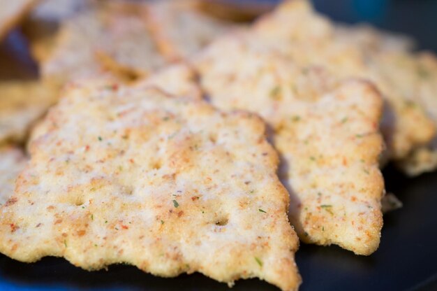 Close up shot of some spiced and salted crackers