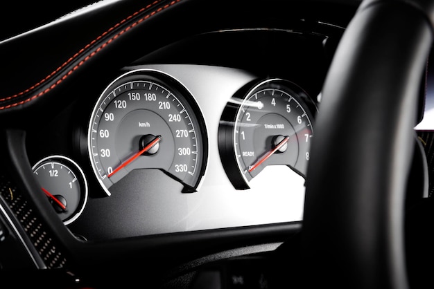 Close up shot of a speedometer in a car