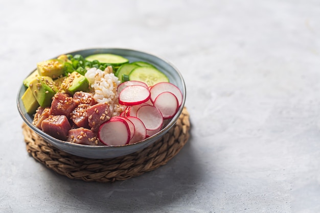 Close up shot of Traditional Hawaiian Poke Bowl prepared with Tuna Fish