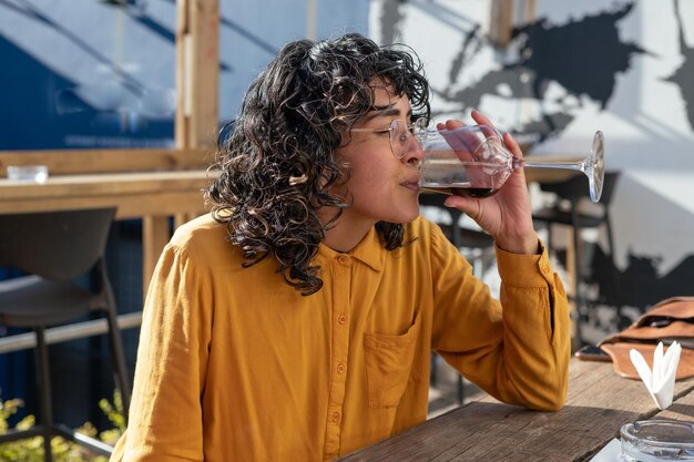 Close up shot of woman drinking wine