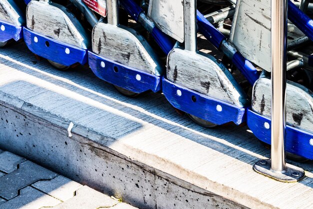 Close-up side view of cropped carts