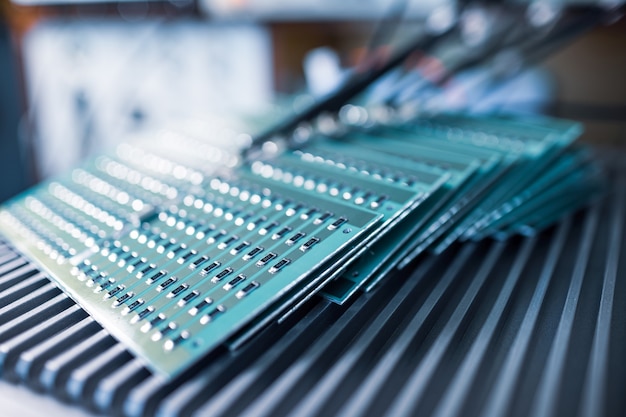 Close-up side view of a panel of SMD resistors