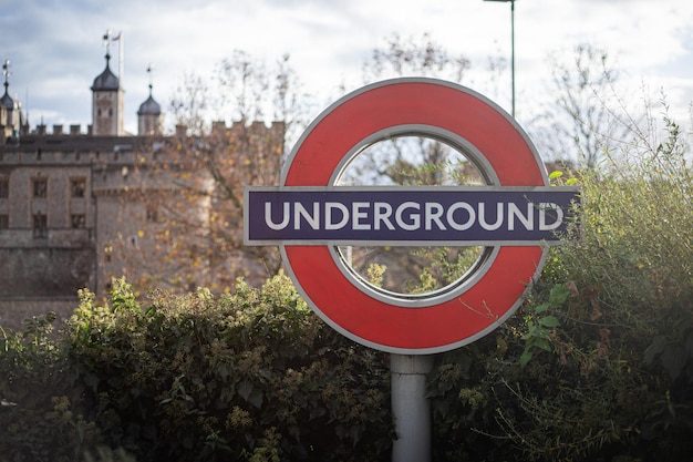 Close-up of the sign of the London Underground symbol, during a beautiful day