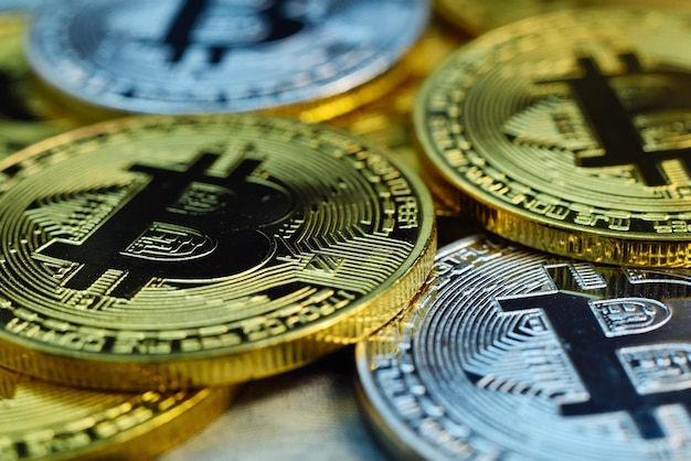 Close up of silver and golden cryptocurrency bitcoins Cryptocurrency and virtual money concept